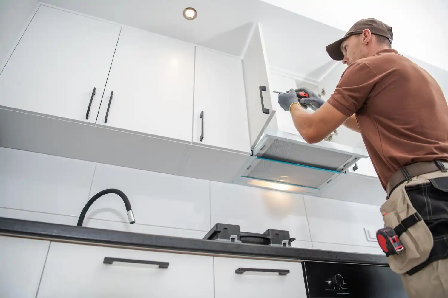 Modern kitchen cabinet installation during a kitchen remodelling project